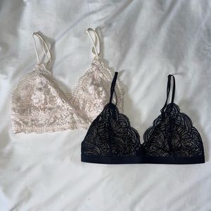 Two Aritzia Talula Bralettes.